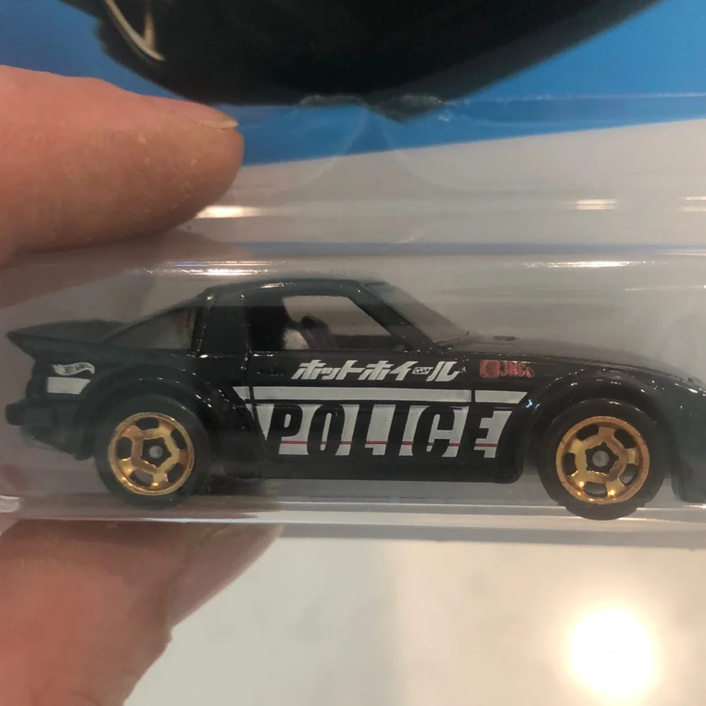 Black Mazda RX-7 Police Car